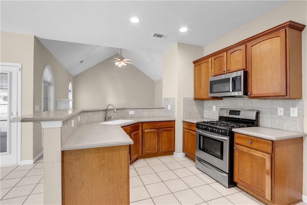 5 bedroom, 3 bathroom, 2,339 sq ft single family residence for sale at 1185 Martins Down Drive, Lawrenceville, GA 30045 — photo 4