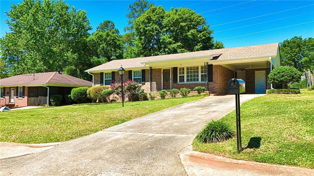 3 bedroom, 1 bathroom, 1,100 sq ft single family residence under contract at 409 Dora Street, Griffin, GA 30223 — photo 2