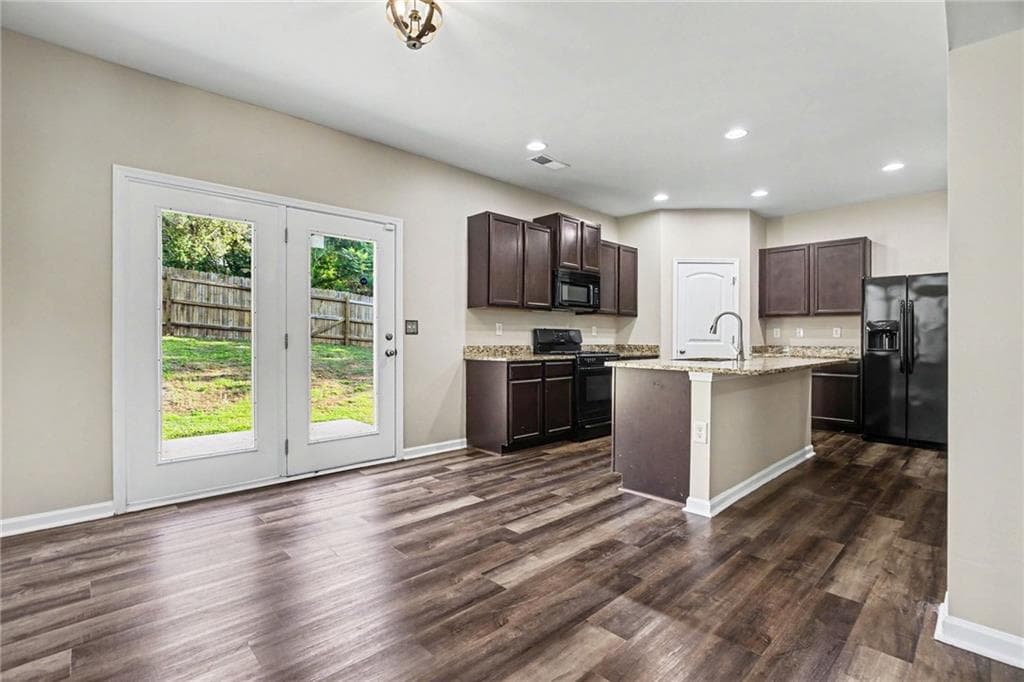 4 bedroom, 3 bathroom, 1,980 sq ft single family residence for sale at 5151 Rapahoe Trail, Atlanta, GA 30349 — photo 5