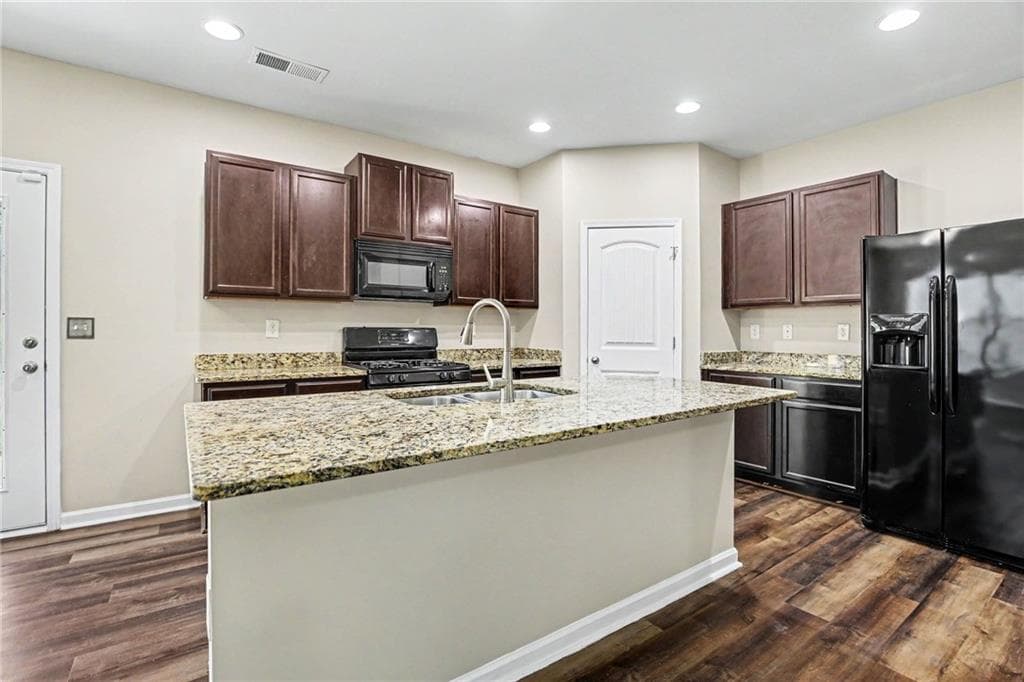 4 bedroom, 3 bathroom, 1,980 sq ft single family residence for sale at 5151 Rapahoe Trail, Atlanta, GA 30349 — photo 7