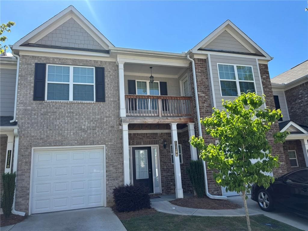 3 bedroom, 3 bathroom, 1,636 sq ft townhouse for sale at 11208 Benton Loop, Covington, GA 30014 — photo 1 of 16