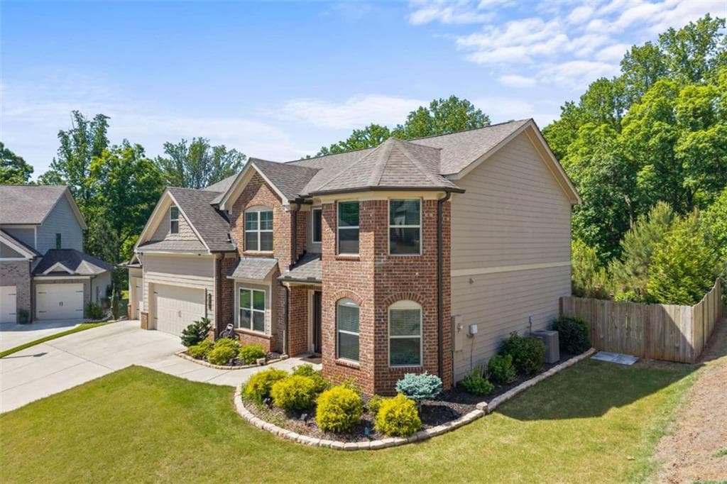 5 bedroom, 3 bathroom, 3,000 sq ft single family residence for sale at 6024 Park Bay Court, Flowery Branch, GA 30542 — photo 2