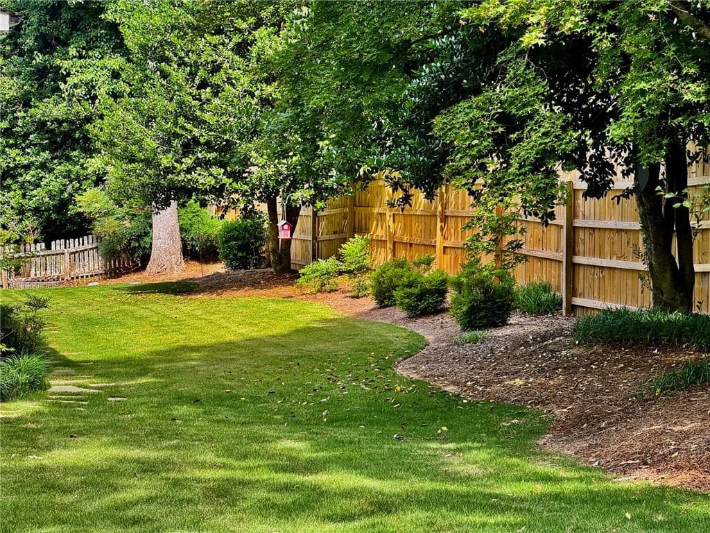 4 bedroom, 3 bathroom, 4,226 sq ft single family residence for sale at 3013 Braxton Court, Kennesaw, GA 30152 — photo 4