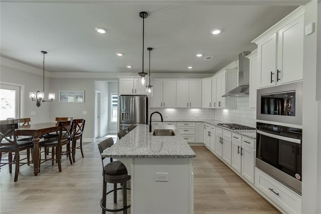 5 bedroom, 4 bathroom, 3,044 sq ft single family residence for sale at 265 Cherokee Rose Lane, Hoschton, GA 30548 — photo 9