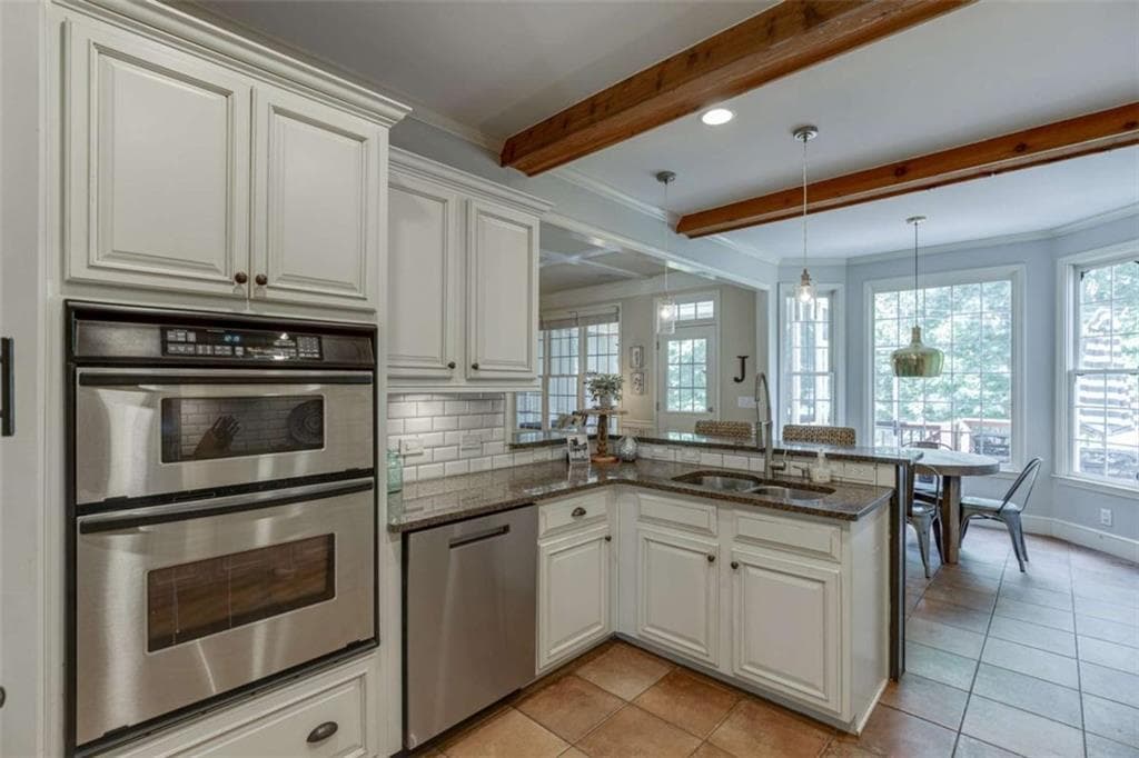 5 bedroom, 4 bathroom, 3,377 sq ft single family residence for sale at 7310 Hedgewood Way, Hoschton, GA 30548 — photo 10