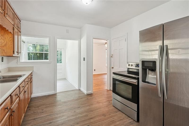 4 bedroom, 2 bathroom, 2,200 sq ft single family residence for sale at 30 Woodlawn Avenue, Hampton, GA 30228 — photo 6