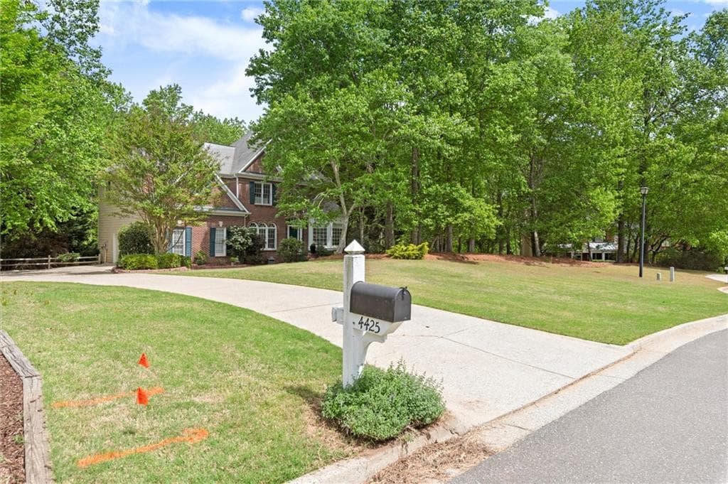 5 bedroom, 4 bathroom, 4,120 sq ft single family residence for sale at 4425 Woodside Court, Cumming, GA 30041 — photo 2