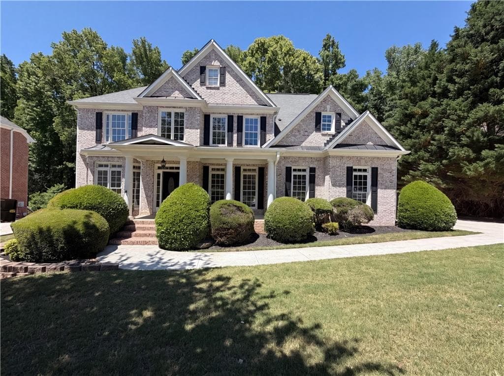4 bedroom, 3 bathroom, 4,017 sq ft single family residence for sale at 861 Windsor Creek Drive, Grayson, GA 30017 — photo 1 of 21