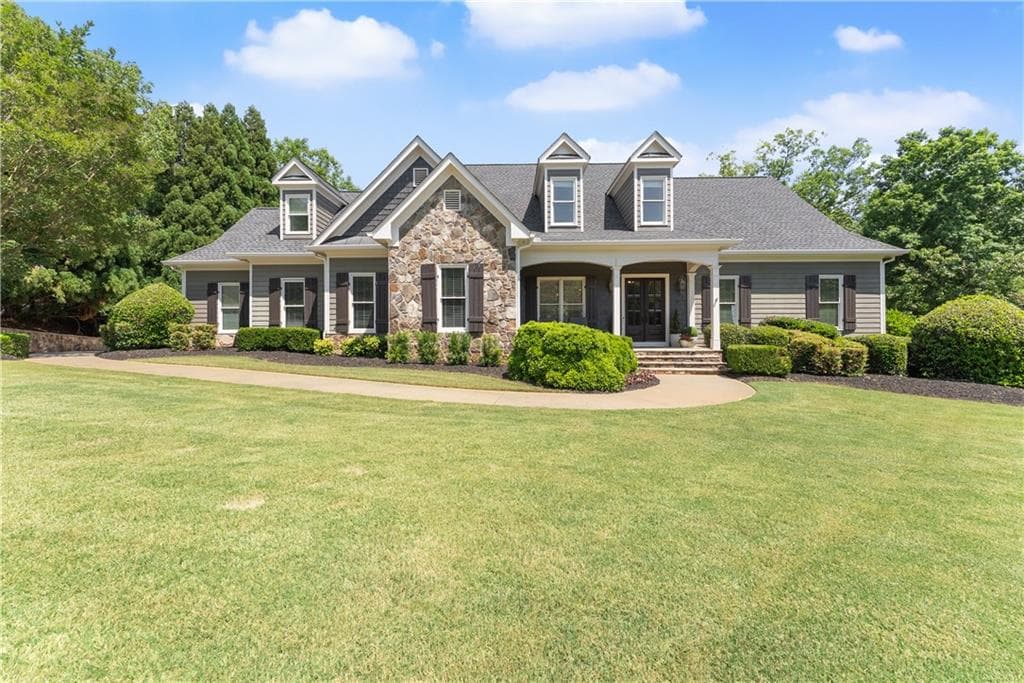 6 bedroom, 7 bathroom, 6,815 sq ft single family residence sold at 5611 Lanyard Court, Gainesville, GA 30504