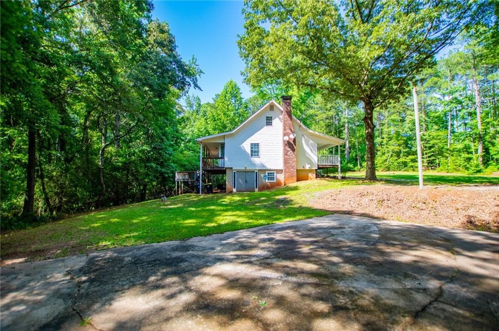 4 bedroom, 3 bathroom, 2,734 sq ft single family residence under contract at 8291 Highway 5, Whitesburg, GA 30185 — photo 7
