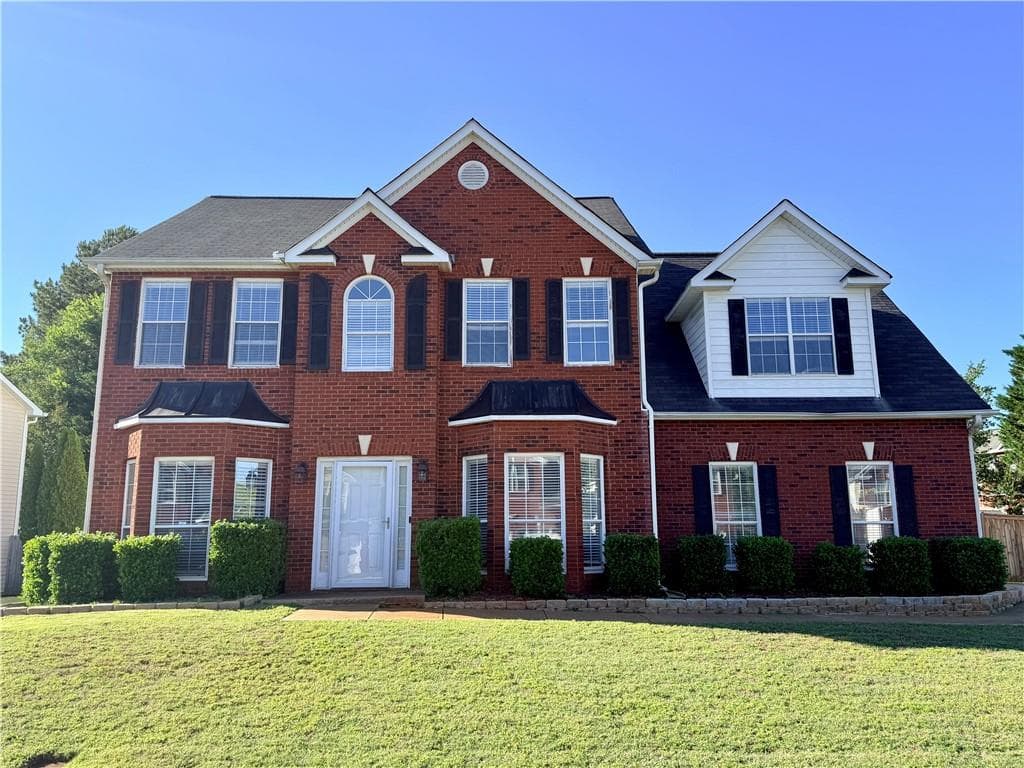 4 bedroom, 3 bathroom, 2,518 sq ft single family residence for sale at 1252 Woodland View Road, Lawrenceville, GA 30043