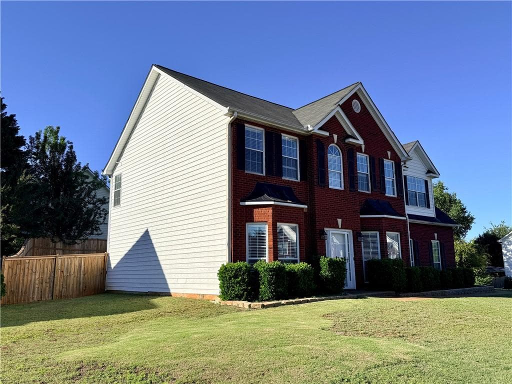 4 bedroom, 3 bathroom, 2,518 sq ft single family residence for sale at 1252 Woodland View Road, Lawrenceville, GA 30043 — photo 2