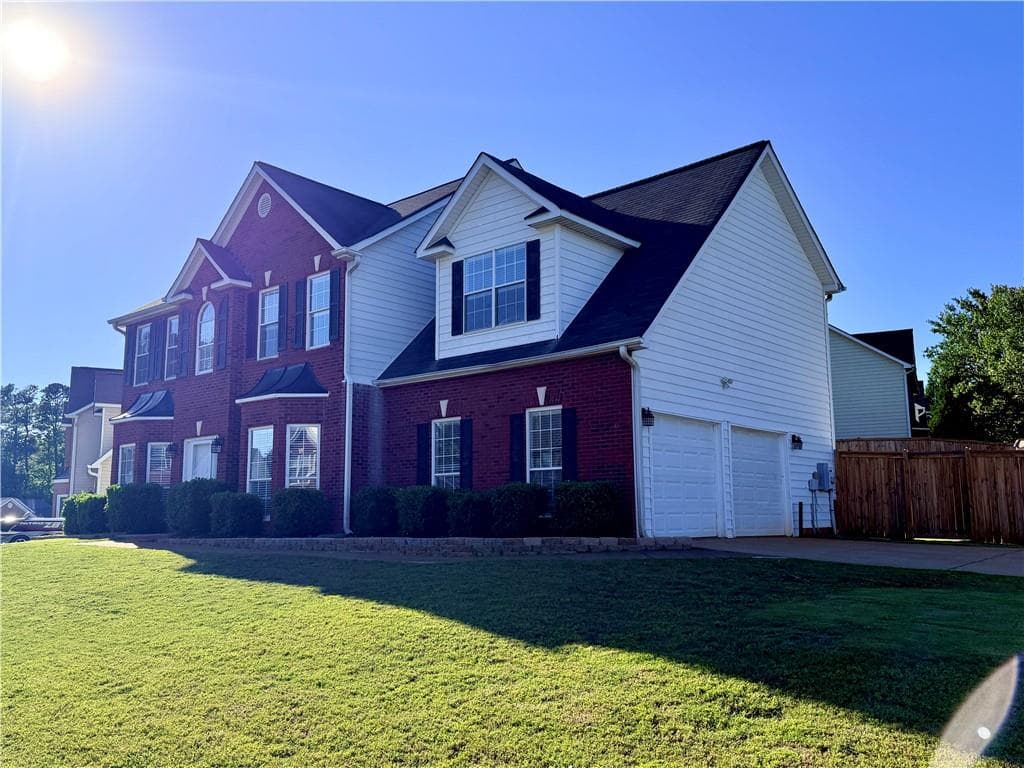 4 bedroom, 3 bathroom, 2,518 sq ft single family residence for sale at 1252 Woodland View Road, Lawrenceville, GA 30043 — photo 3