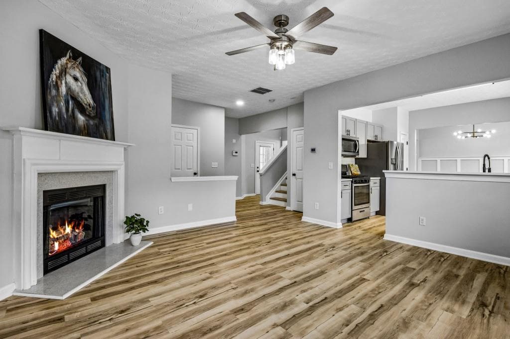 4 bedroom, 3 bathroom, 1,928 sq ft single family residence for sale at 313 Woodland Pass, Canton, GA 30114 — photo 2