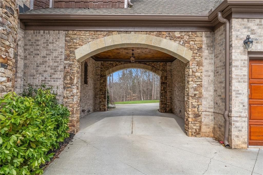 6 bedroom, 8 bathroom, 9,755 sq ft single family residence for sale at 14560 Wood Road, Milton, GA 30004 — photo 4