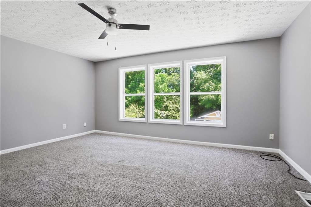 4 bedroom, 3 bathroom, 1,874 sq ft single family residence for sale at 1241 Pine Acre Drive, Sugar Hill, GA 30518 — photo 4