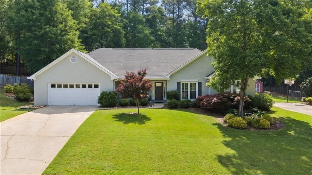 4 bedroom, 3 bathroom, 2,554 sq ft single family residence sold at 409 Taberon Road, Peachtree City, GA 30269
