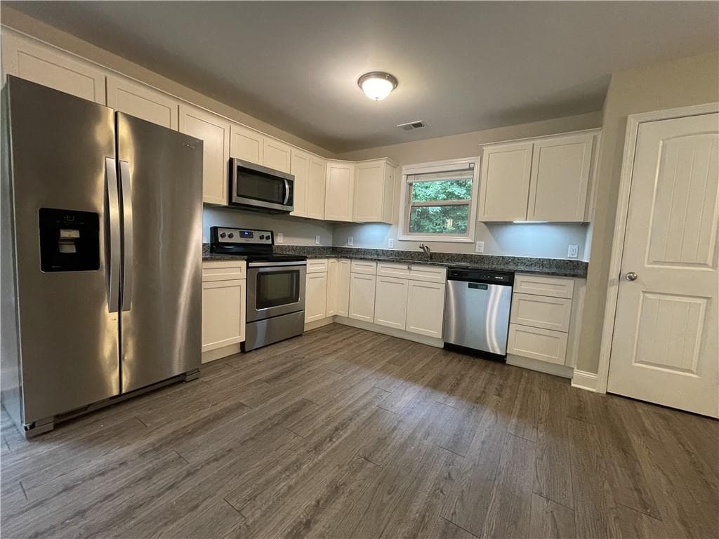 3 bedroom, 3 bathroom, 1,380 sq ft single family residence for sale at 5350 Tomahawk Terrace, Gainesville, GA 30506 — photo 9