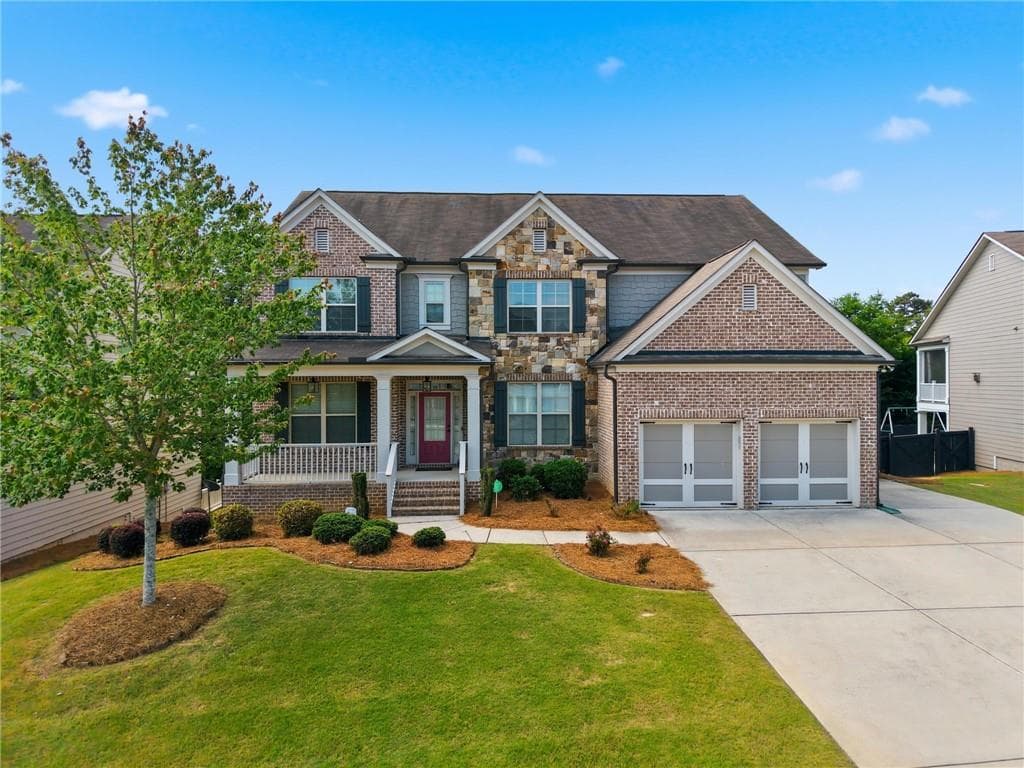 4 bedroom, 5 bathroom, 4,024 sq ft single family residence for sale at 2410 Wildlife Court, Buford, GA 30519 — photo 1 of 69