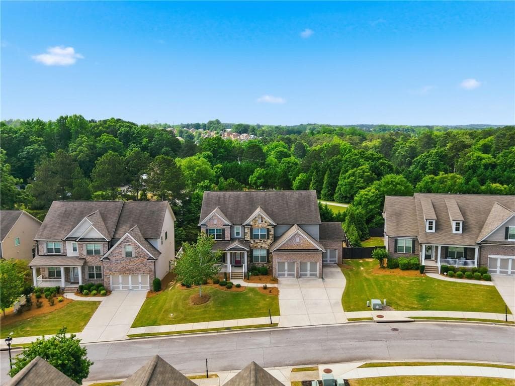 4 bedroom, 5 bathroom, 4,024 sq ft single family residence for sale at 2410 Wildlife Court, Buford, GA 30519 — photo 3