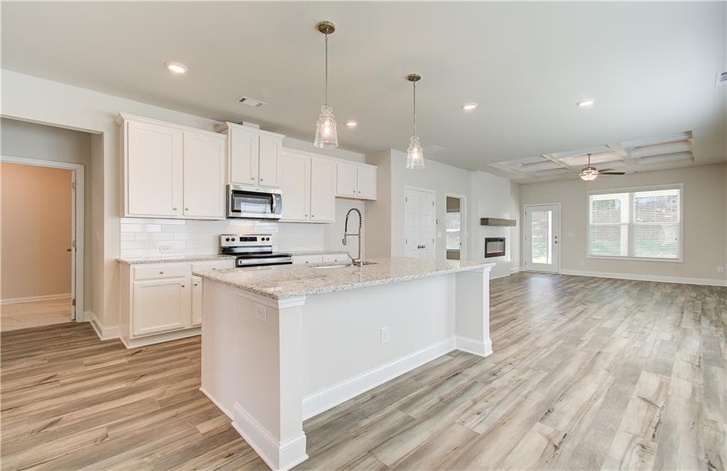 5 bedroom, 4 bathroom, 2,589 sq ft single family residence for sale at 21 Butternut Way, Auburn, GA 30011 — photo 4