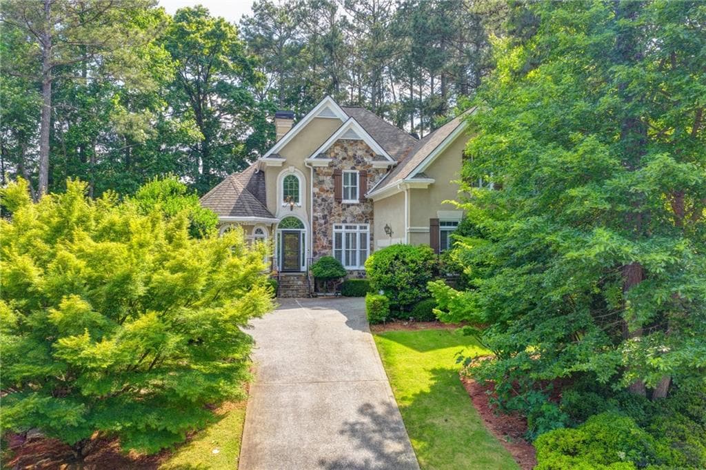 4 bedroom, 5 bathroom, 4,567 sq ft single family residence under contract at 4030 Newgate Court, Alpharetta, GA 30022 — photo 2