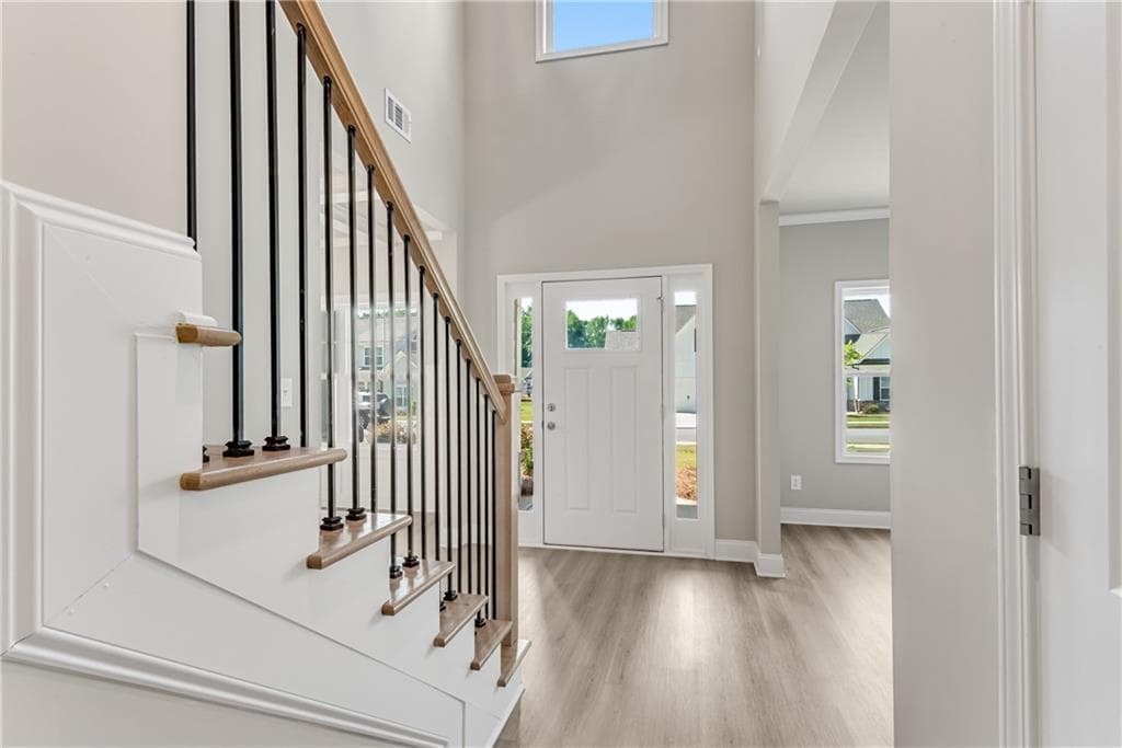5 bedroom, 4 bathroom, 3,420 sq ft single family residence for sale at 237 Cherokee Rose Lane, Hoschton, GA 30548 — photo 4