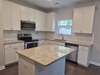 4 bedroom, 3 bathroom, 2,599 sq ft single family residence for sale at 3213 Camden Court, South Fulton, GA 30349 — photo 5