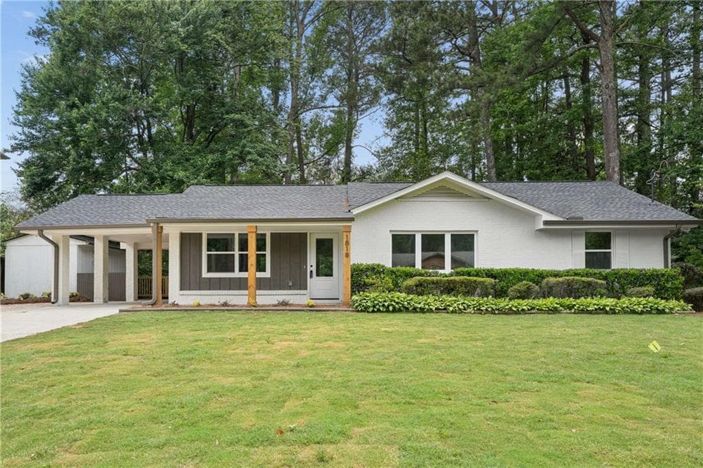 4 bedroom, 3 bathroom single family residence sold at 1818 Briarlake Circle, Decatur, GA 30033