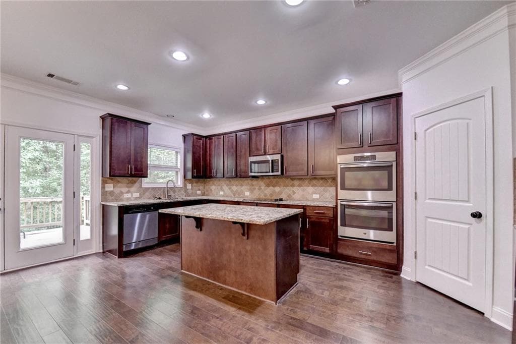 4 bedroom, 4 bathroom, 2,462 sq ft townhouse for sale at 1159 Laurel Valley Court, Buford, GA 30519 — photo 7