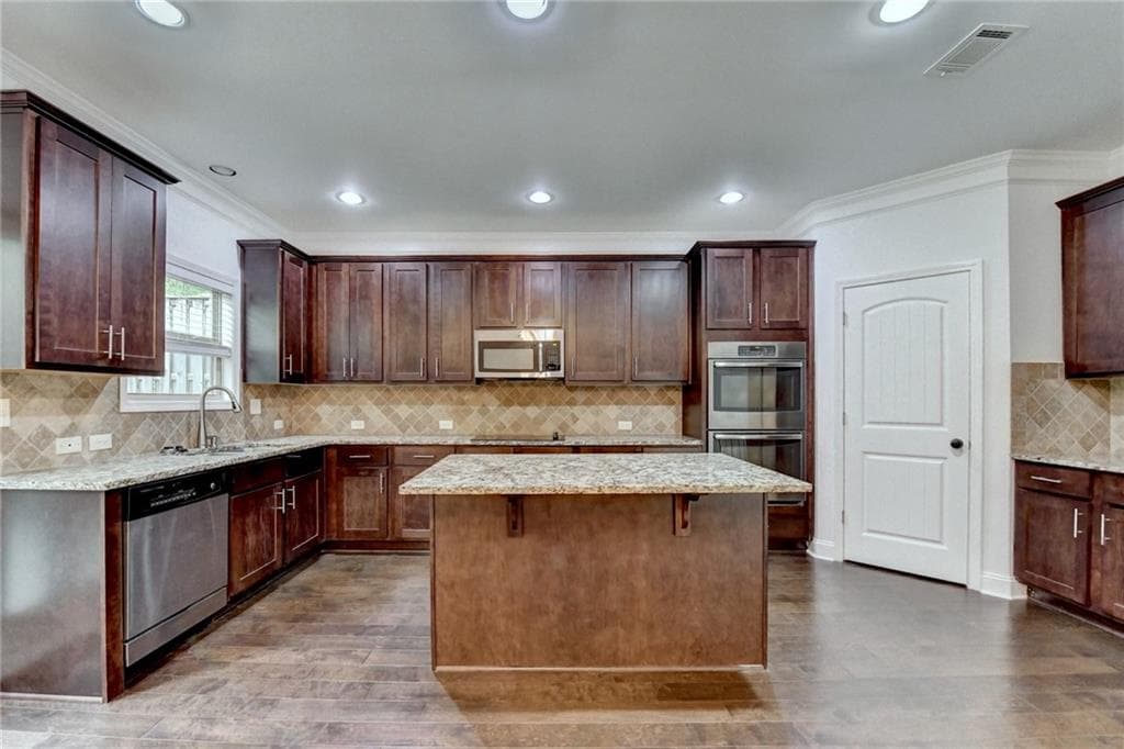 4 bedroom, 4 bathroom, 2,462 sq ft townhouse for sale at 1159 Laurel Valley Court, Buford, GA 30519 — photo 8