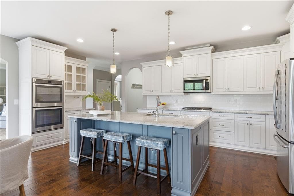 5 bedroom, 4 bathroom, 3,989 sq ft single family residence for sale at 4010 Pinebrook Circle, Cumming, GA 30028 — photo 4