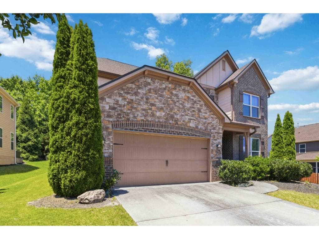5 bedroom, 4 bathroom, 3,243 sq ft single family residence for sale at 6220 Carleen Court, Cumming, GA 30040 — photo 2