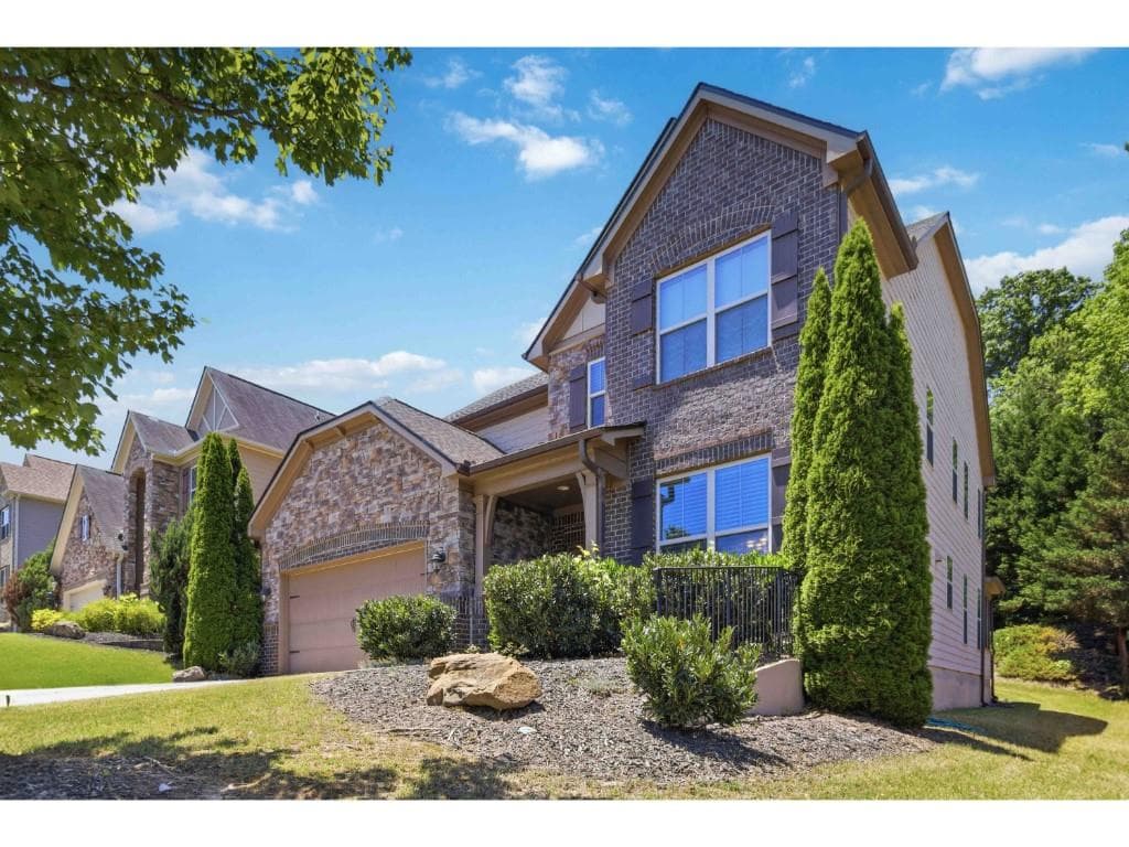 5 bedroom, 4 bathroom, 3,243 sq ft single family residence for sale at 6220 Carleen Court, Cumming, GA 30040 — photo 3