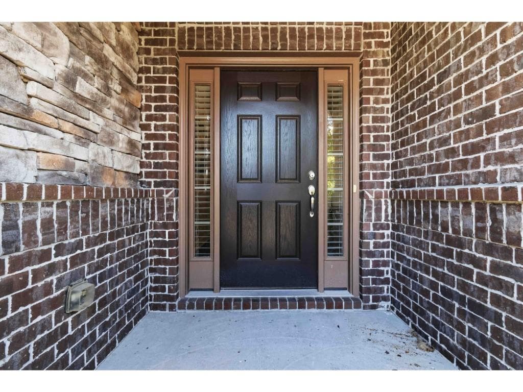 5 bedroom, 4 bathroom, 3,243 sq ft single family residence for sale at 6220 Carleen Court, Cumming, GA 30040 — photo 4
