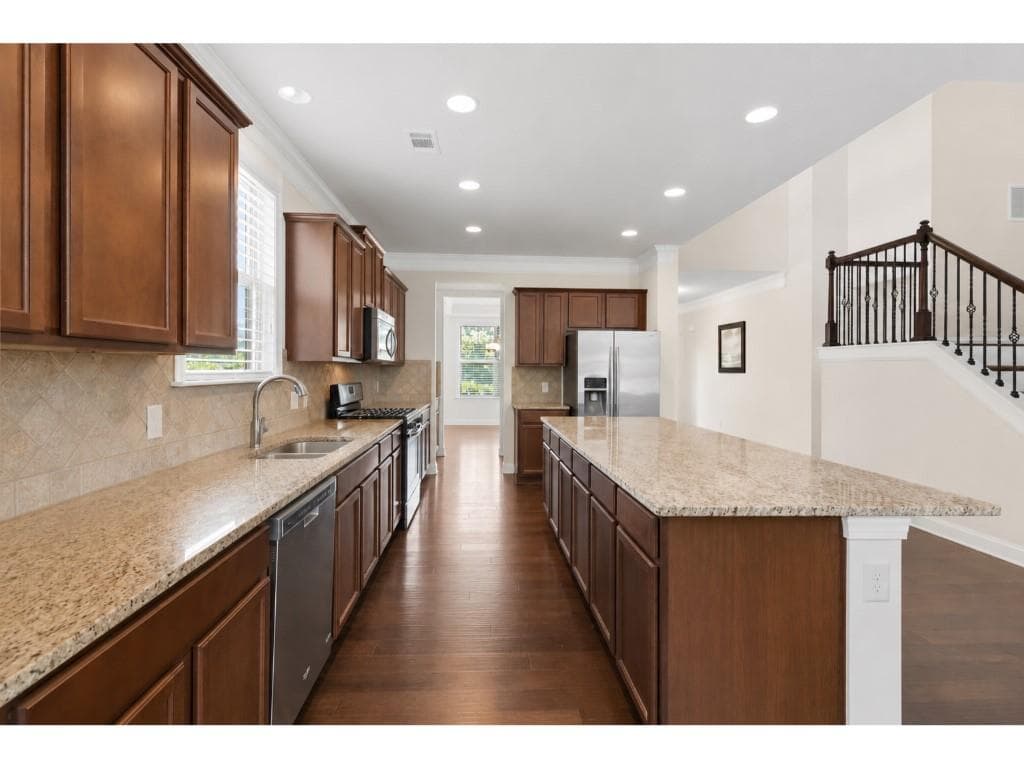 5 bedroom, 4 bathroom, 3,243 sq ft single family residence for sale at 6220 Carleen Court, Cumming, GA 30040 — photo 8