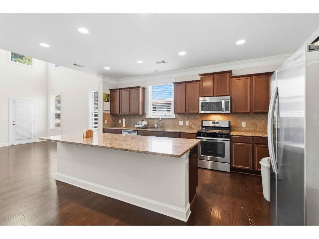 5 bedroom, 4 bathroom, 3,243 sq ft single family residence for sale at 6220 Carleen Court, Cumming, GA 30040 — photo 10