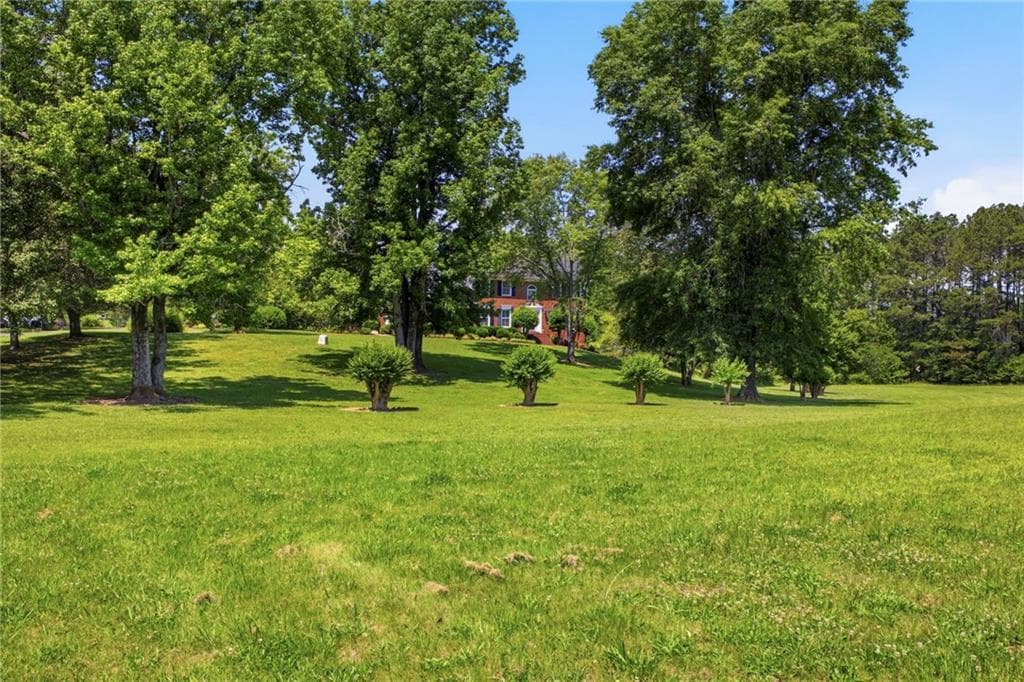 6 bedroom, 4 bathroom, 4,770 sq ft single family residence for sale at 2630 Chatsworth Highway 225, Calhoun, GA 30701 — photo 4