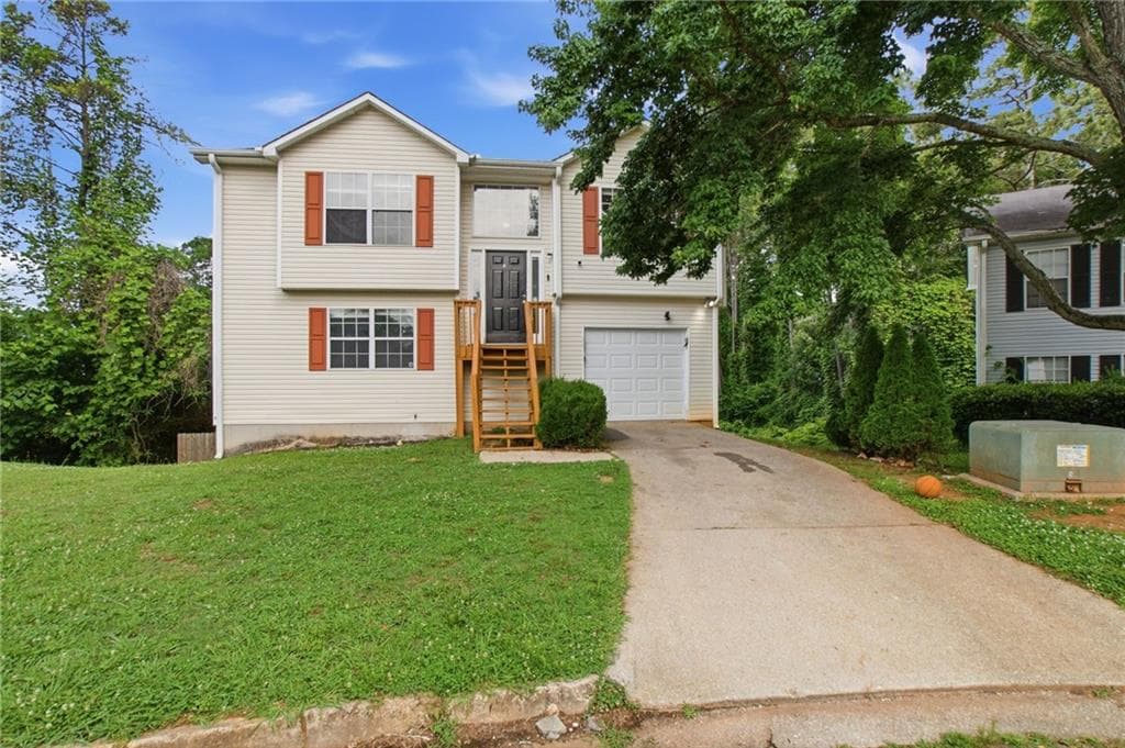 3 bedroom, 2 bathroom, 1,275 sq ft single family residence for sale at 5855 Crescent Ridge Court, Lithonia, GA 30058 — photo 1 of 46