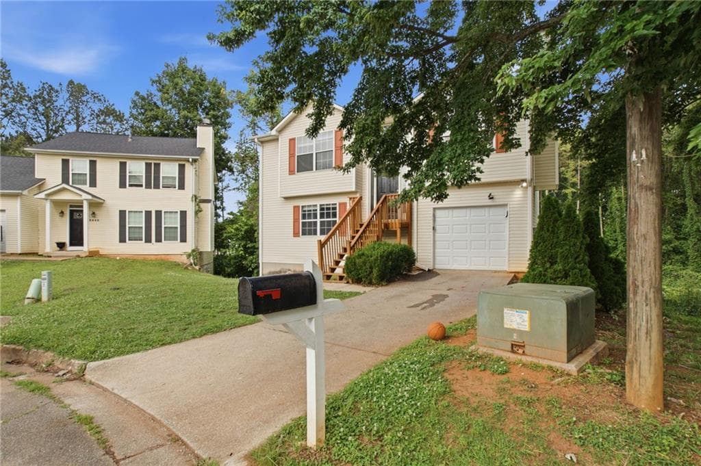 3 bedroom, 2 bathroom, 1,275 sq ft single family residence for sale at 5855 Crescent Ridge Court, Lithonia, GA 30058 — photo 2