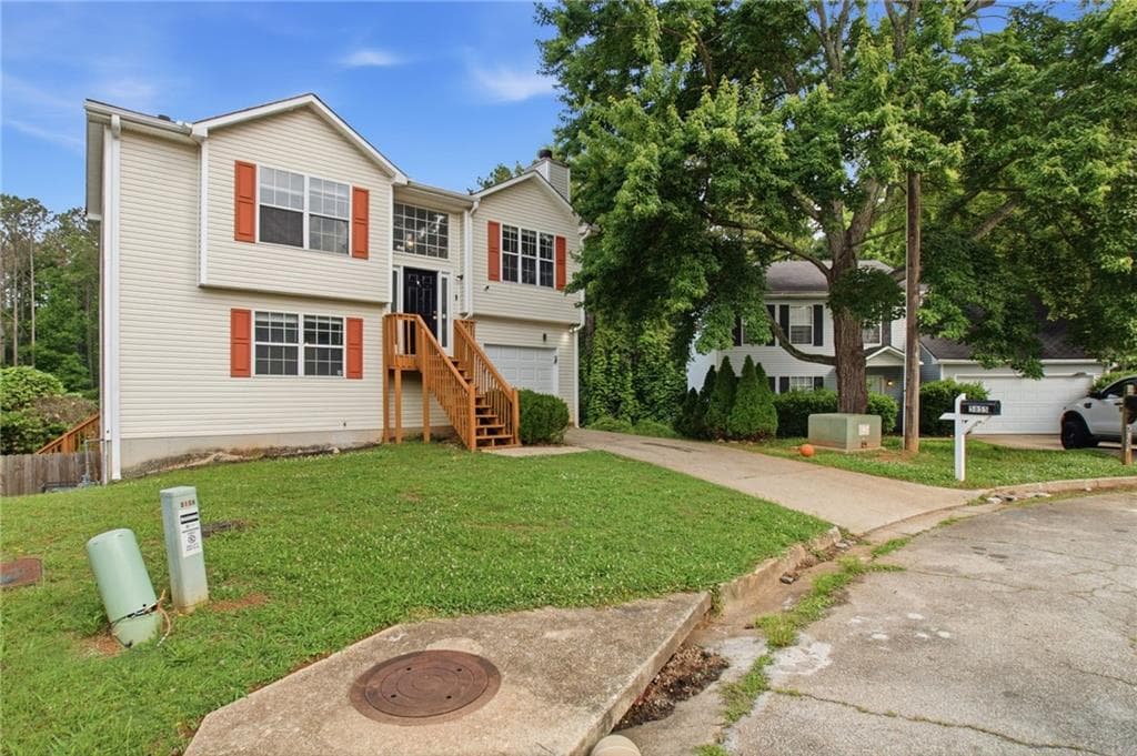 3 bedroom, 2 bathroom, 1,275 sq ft single family residence for sale at 5855 Crescent Ridge Court, Lithonia, GA 30058 — photo 3