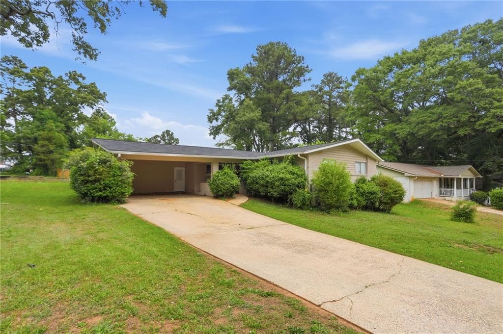 3 bedroom, 2 bathroom, 1,409 sq ft single family residence for sale at 3840 Emerald North Drive, Decatur, GA 30035 — photo 3