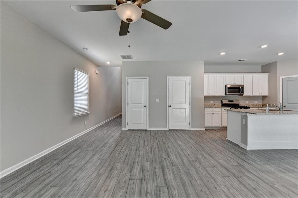 4 bedroom, 3 bathroom, 1,847 sq ft single family residence for sale at 125 Osprey Overlook Drive, Braselton, GA 30517 — photo 6