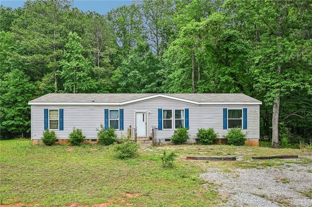 4 bedroom, 2 bathroom, 1,568 sq ft single family residence for sale at 5805 Saddle Club Road, Gainesville, GA 30506 — photo 1 of 27
