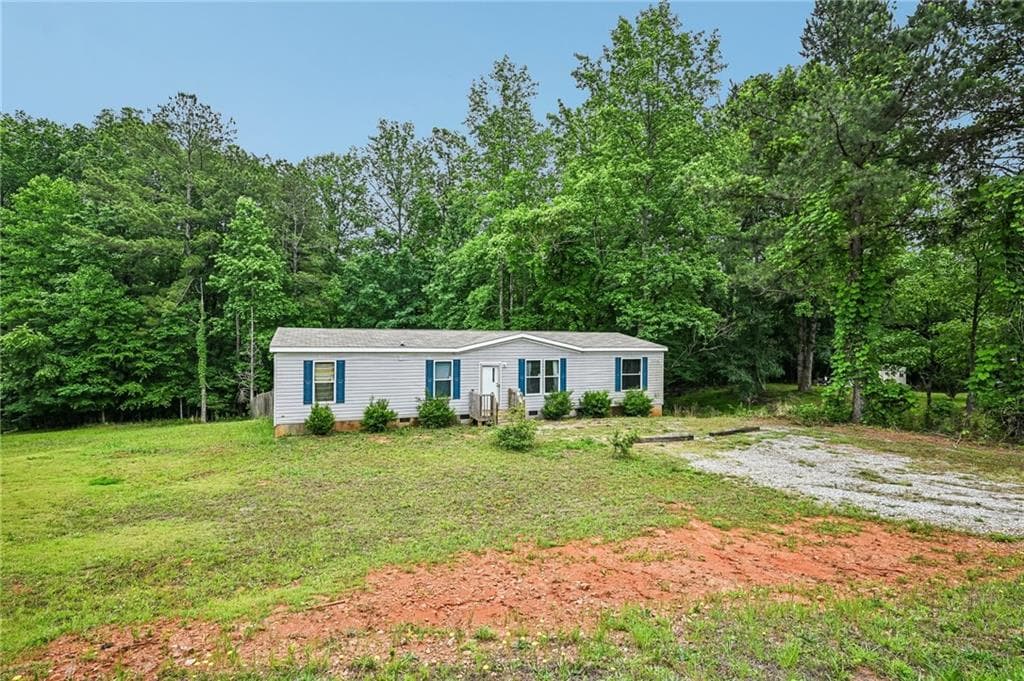 4 bedroom, 2 bathroom, 1,568 sq ft single family residence for sale at 5805 Saddle Club Road, Gainesville, GA 30506 — photo 2