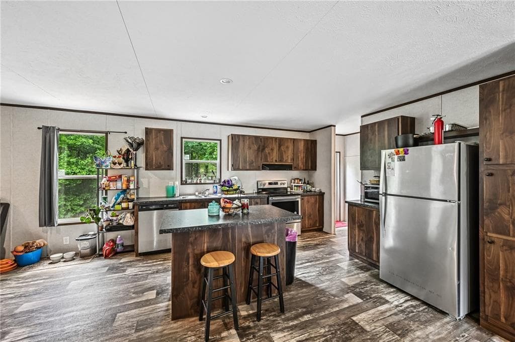 4 bedroom, 2 bathroom, 1,568 sq ft single family residence for sale at 5805 Saddle Club Road, Gainesville, GA 30506 — photo 3