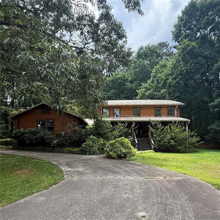 4 bedroom, 3 bathroom, 2,629 sq ft single family residence for sale at 2648 Tribble Mill Road, Lawrenceville, GA 30045