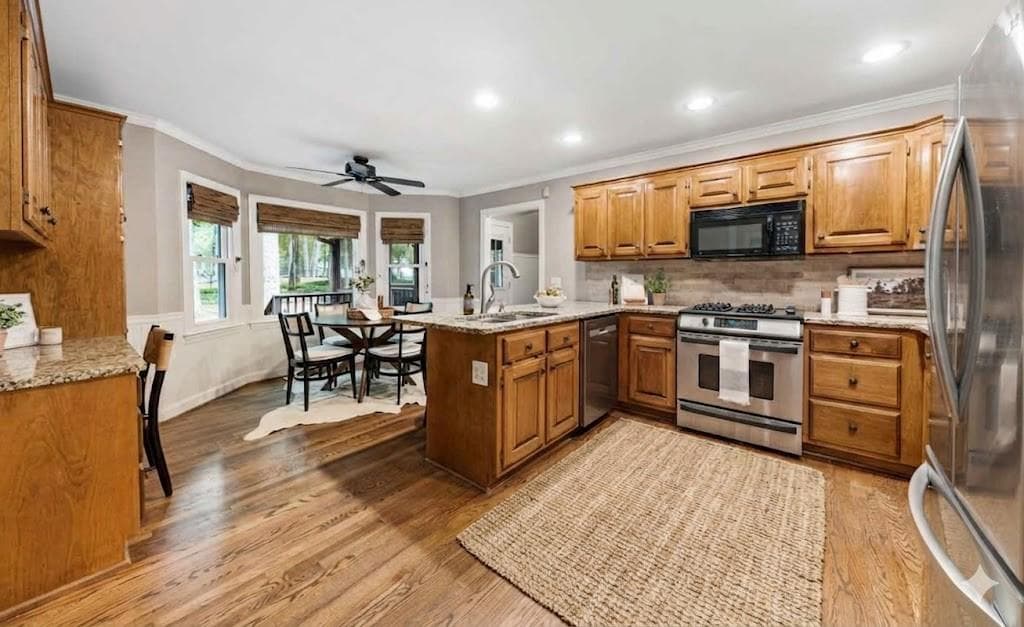 4 bedroom, 3 bathroom, 3,516 sq ft single family residence for sale at 740 Windsor Court, Alpharetta, GA 30009 — photo 4