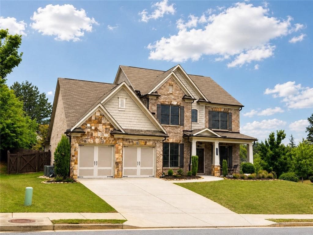 4 bedroom, 4 bathroom, 3,396 sq ft single family residence for sale at 4220 Oxcliffe Grove, Suwanee, GA 30024 — photo 2