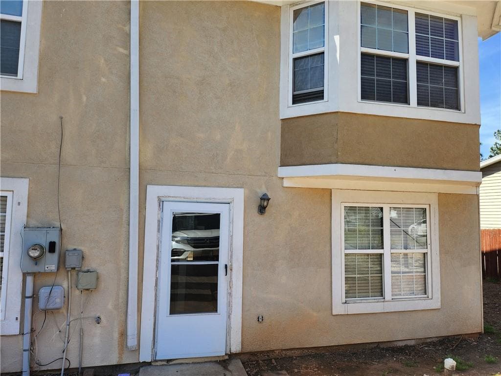 3 bedroom, 3 bathroom, 1,206 sq ft townhouse for sale at 2935 Fields Drive, Lithonia, GA 30038 — photo 1 of 13